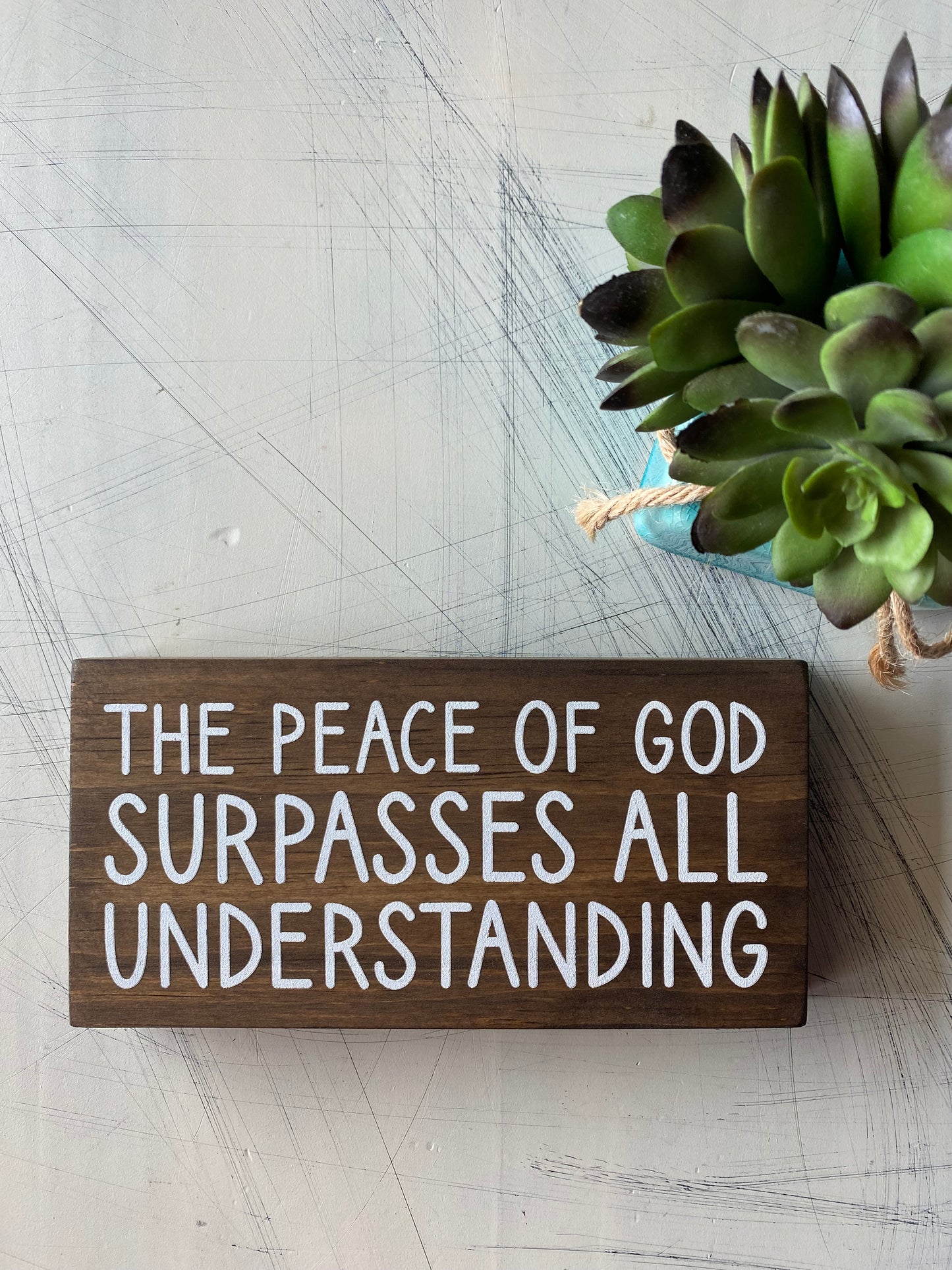 The peace of God surpasses all understanding. - Novotny Designs handmade mini wood sign