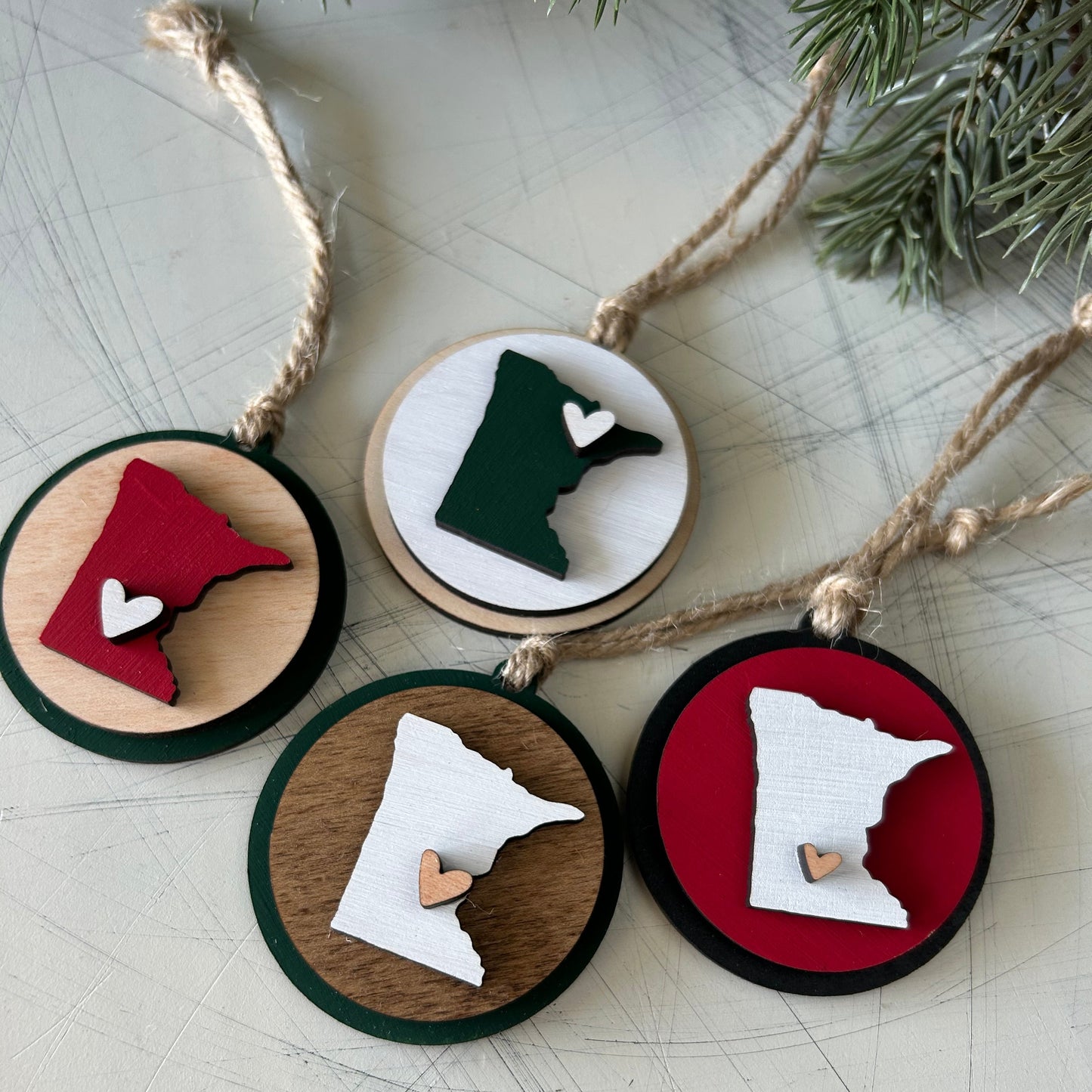 Small handmade Minnesota round ornament with heart by Novotny Designs