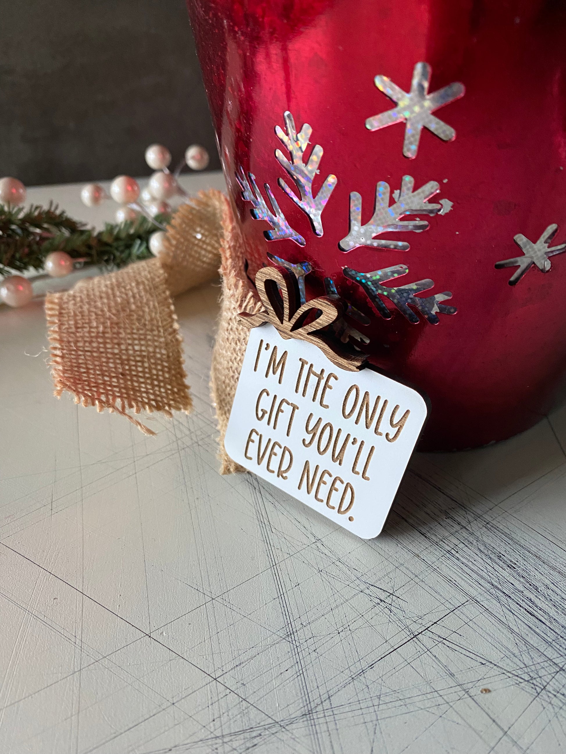 I'm the only gift you'll ever need. - Novotny Designs - funny engraved wood magnet with bow