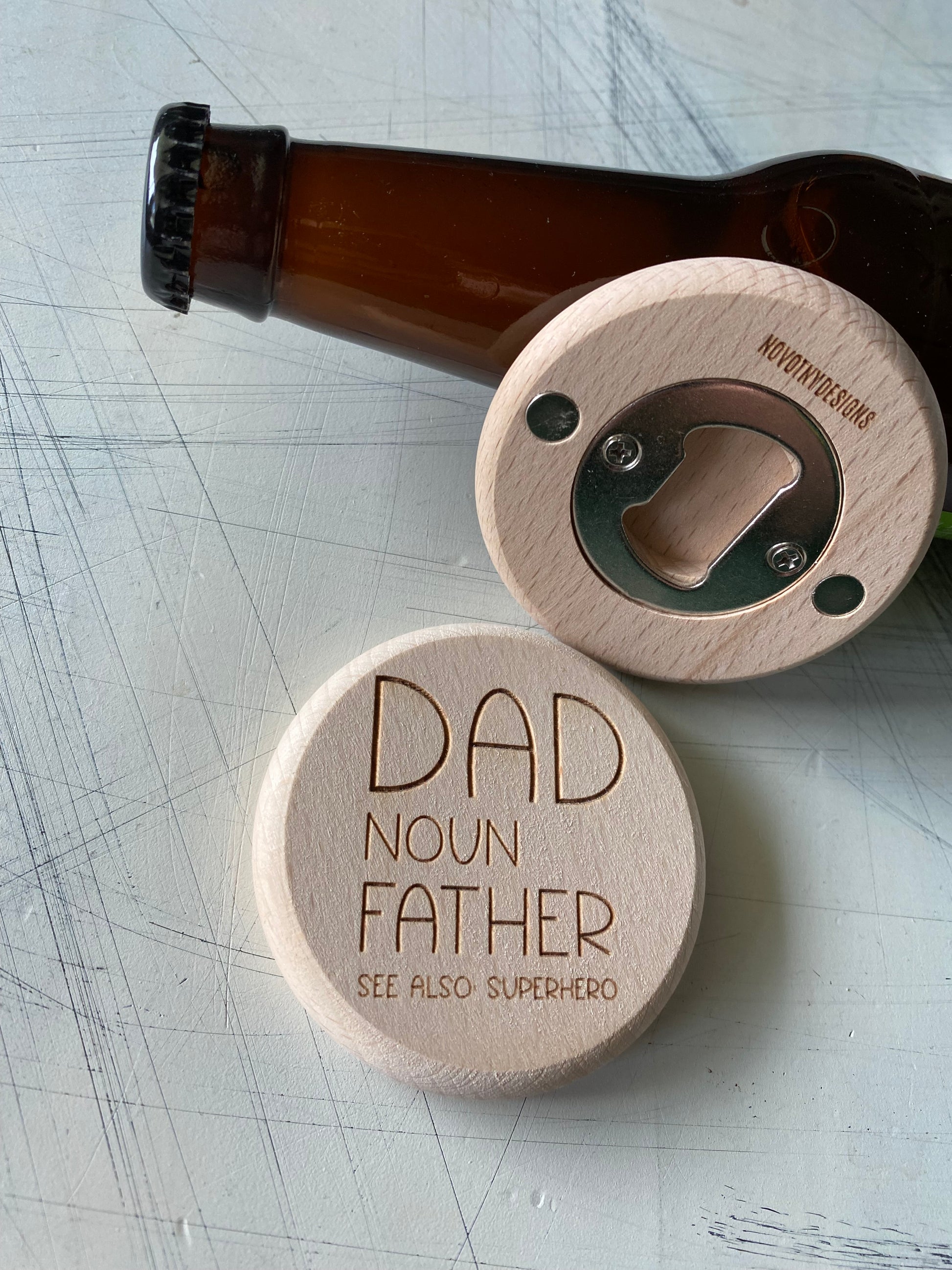 Dad. Noun. Father. See also: Superhero. - Novotny Designs - engraved wood magnetic wood bottle opener
