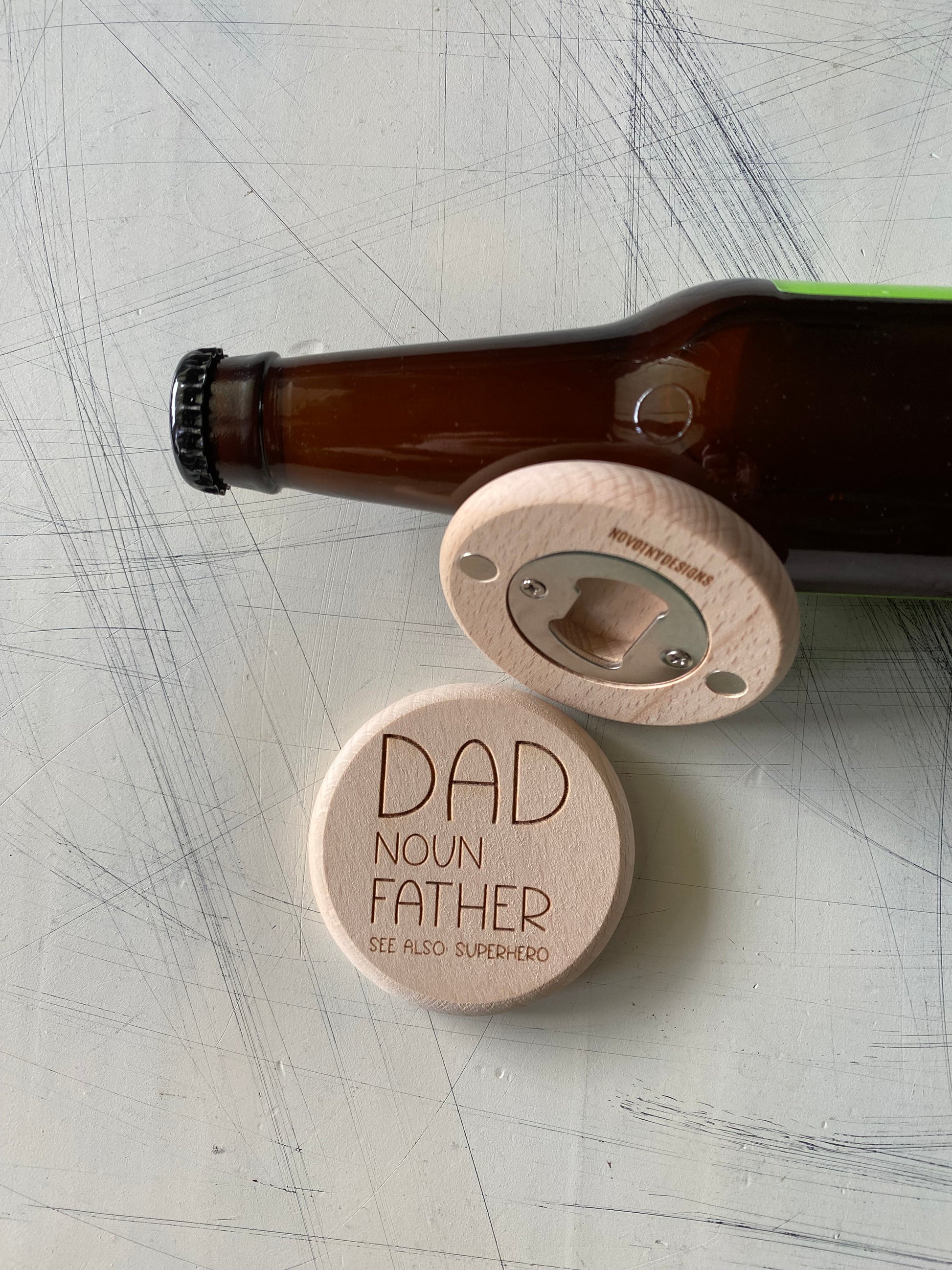Dad. Noun. Father. See also: Superhero. - Novotny Designs - engraved wood magnetic wood bottle opener
