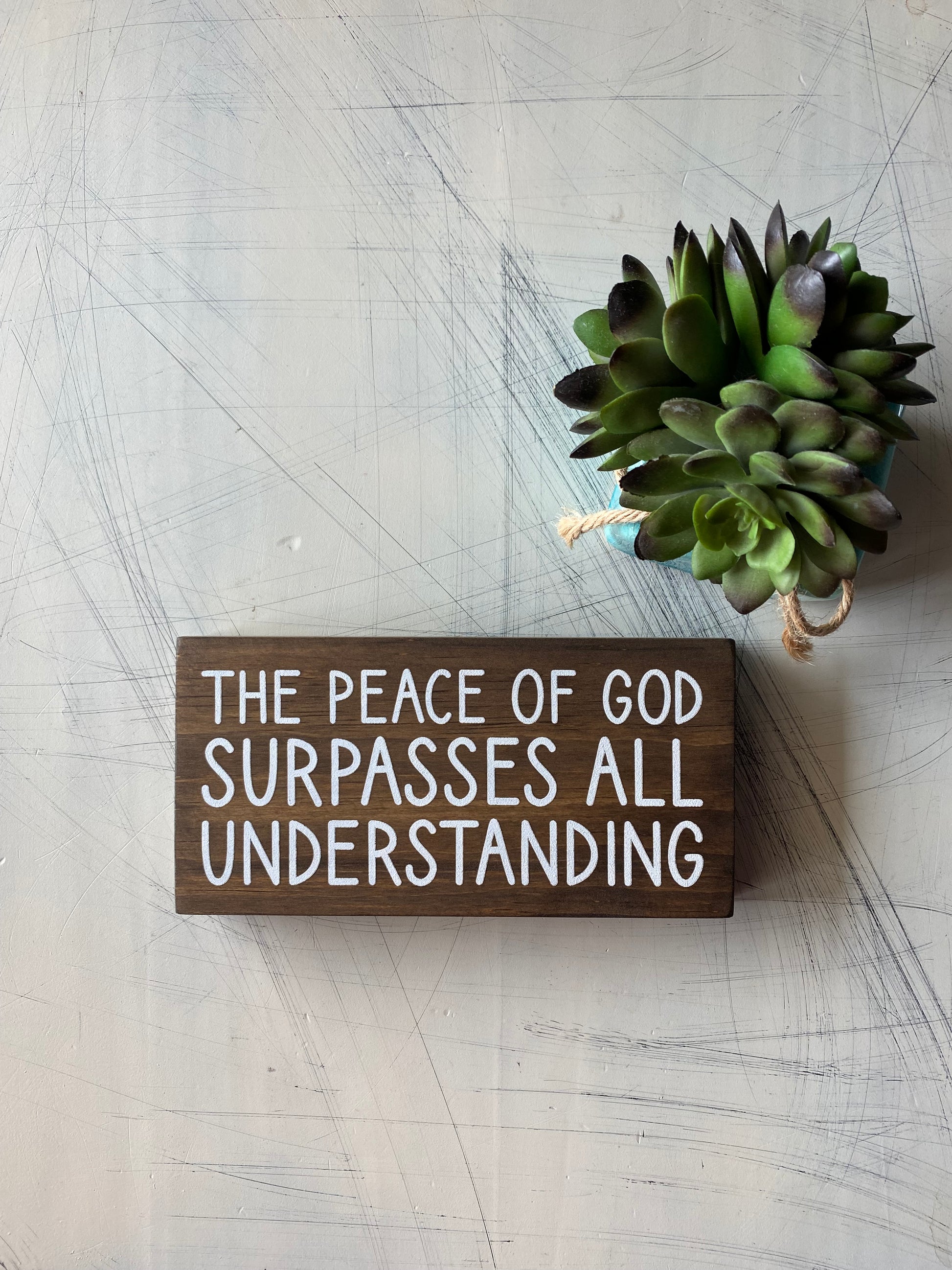 The peace of God surpasses all understanding. - Novotny Designs handmade mini wood sign