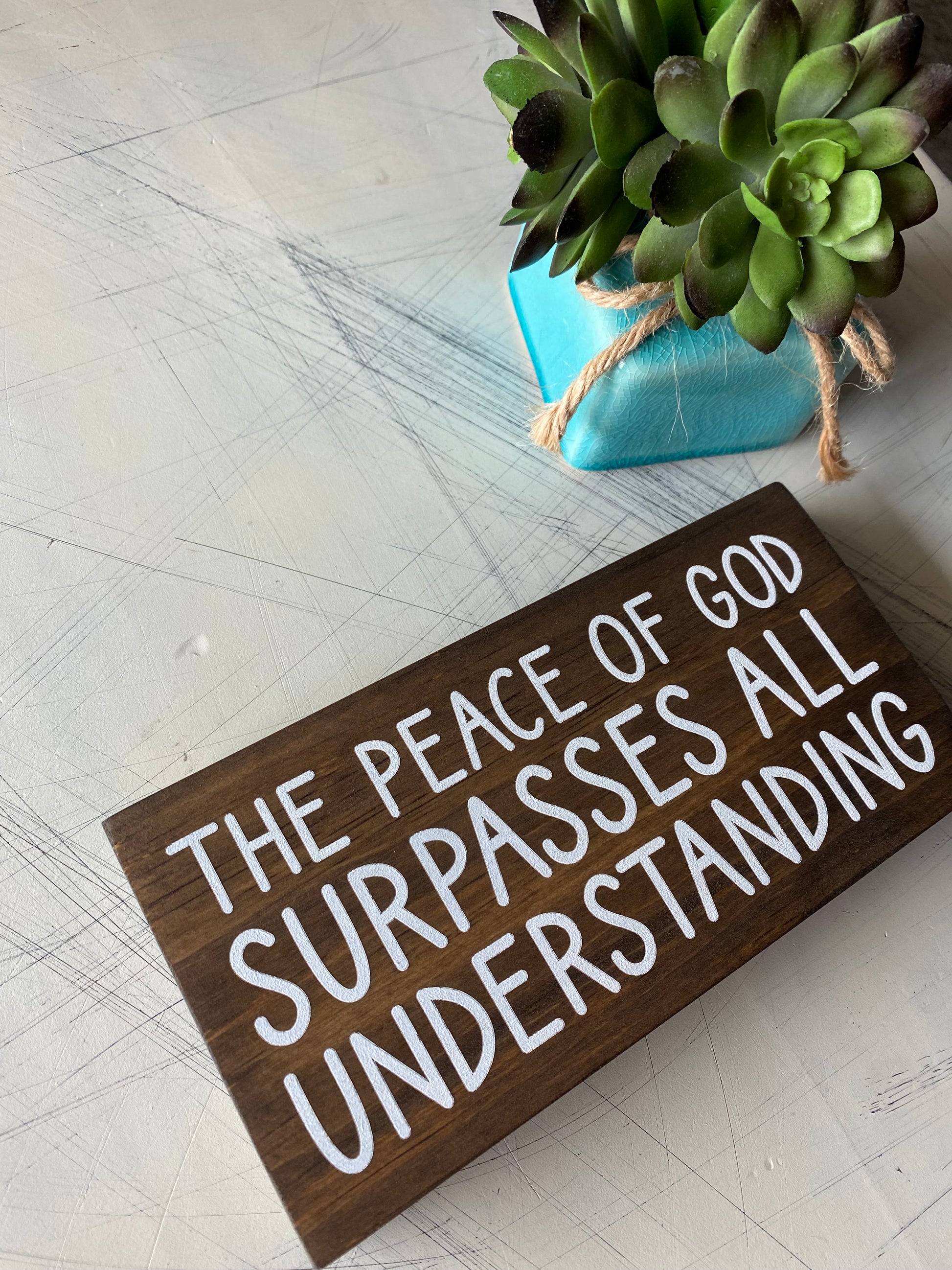 The peace of God surpasses all understanding. - Novotny Designs handmade mini wood sign