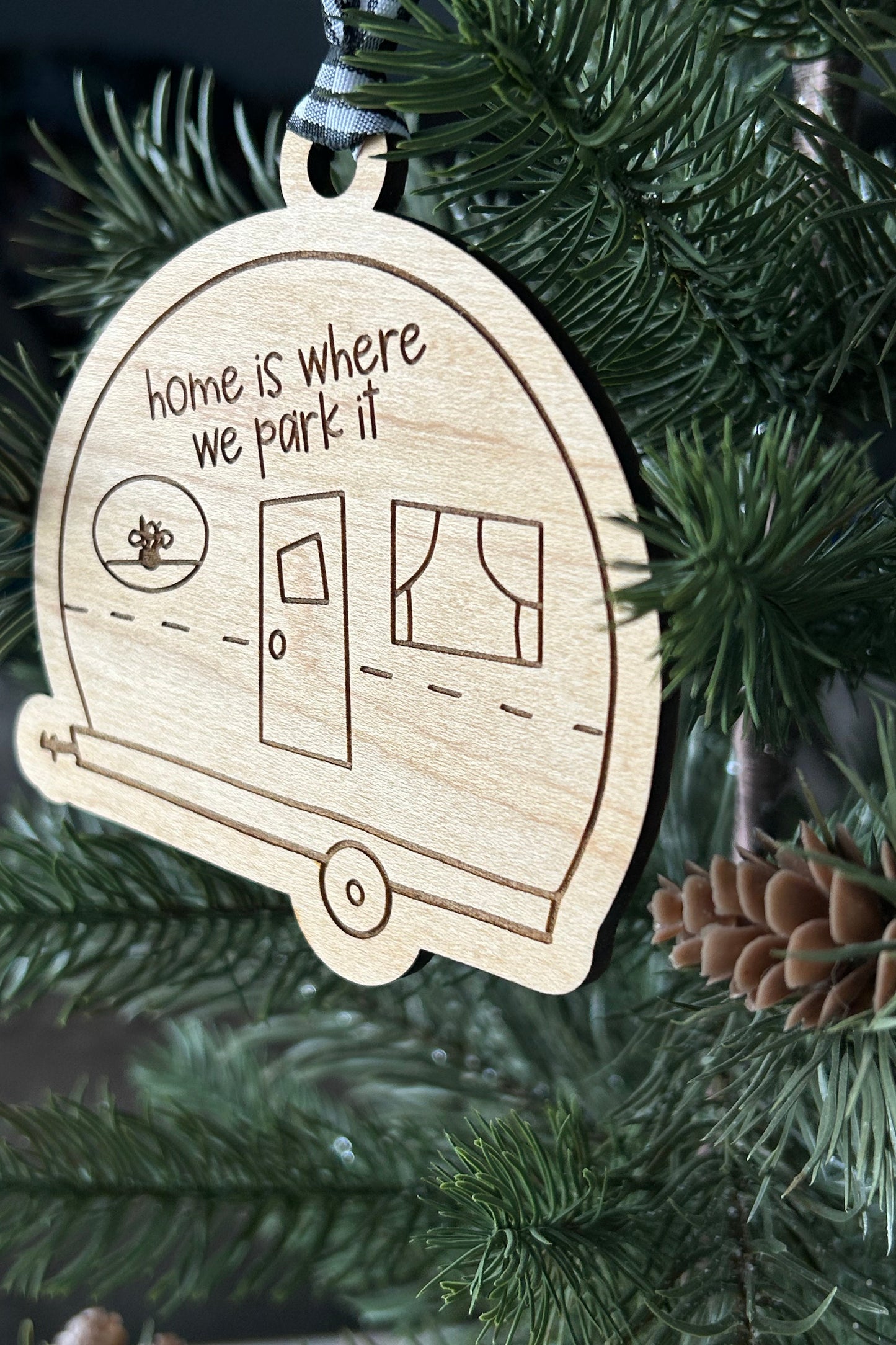 Home is where we park it - wood ornament in the shape of a camper doodle by Novotny Designs