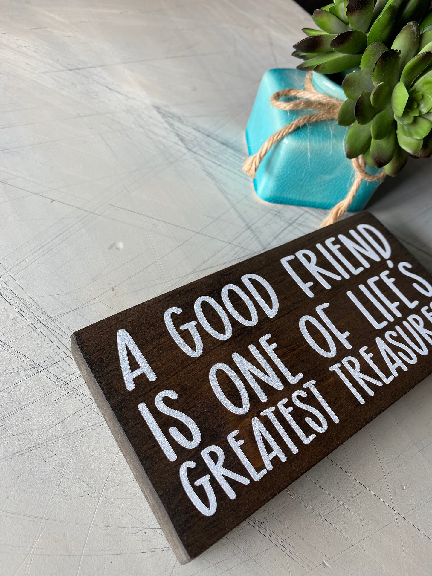 A good friend is one of life's greatest treasures. - Novotny Designs handmade mini wood sign