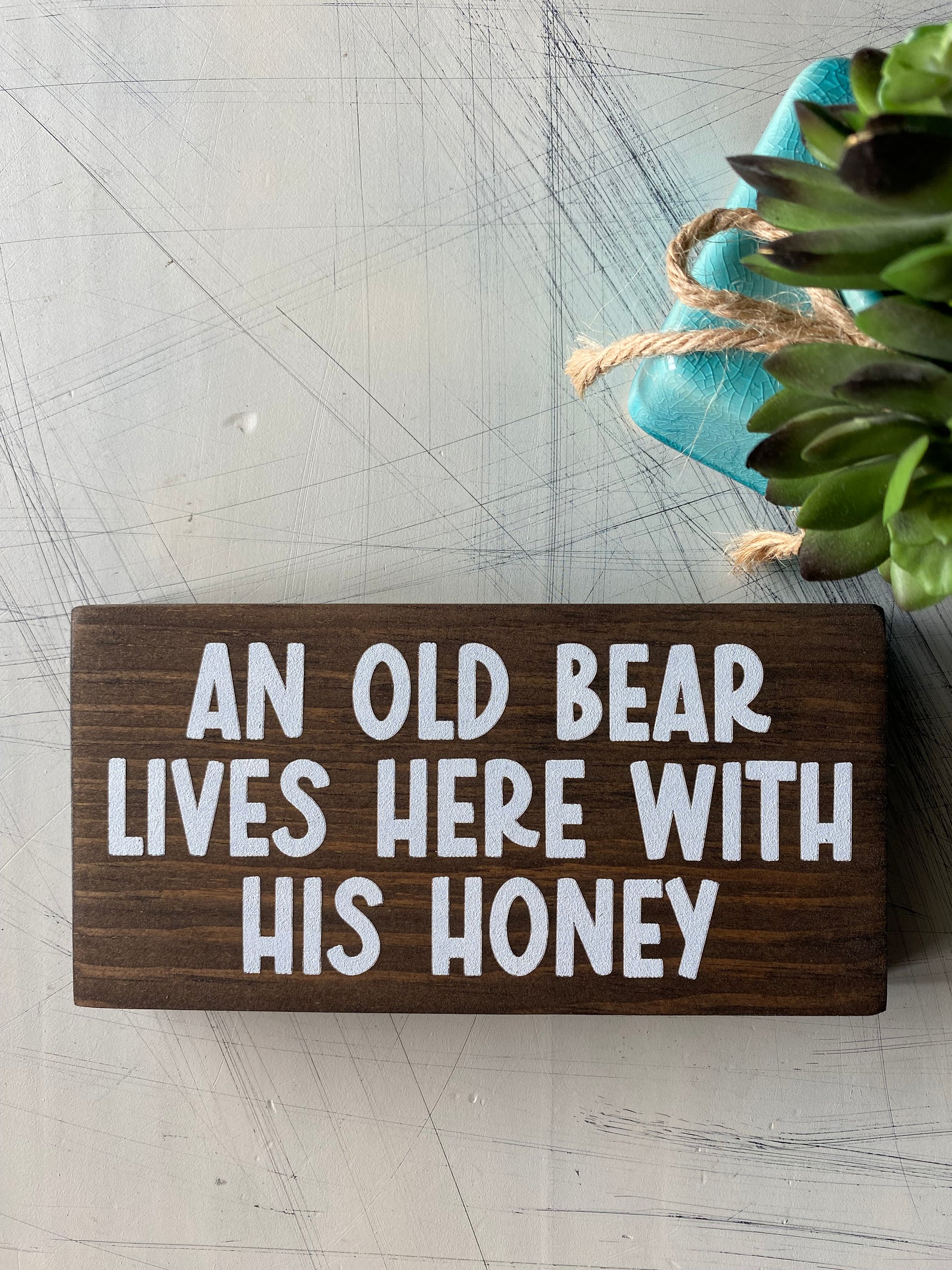 An old bear lives here with his honey. - choose your pronoun - Novotny Designs handmade mini wood sign