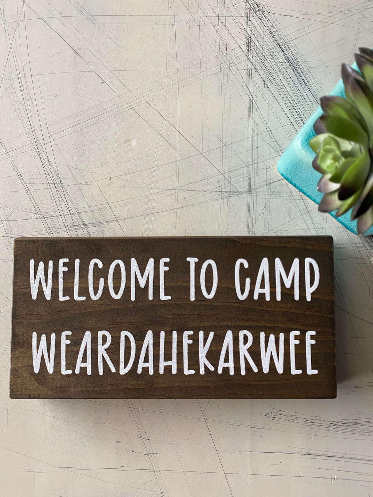 Welcome to Camp Weardahekarwee - Novotny Designs handmade mini wood sign in mocha