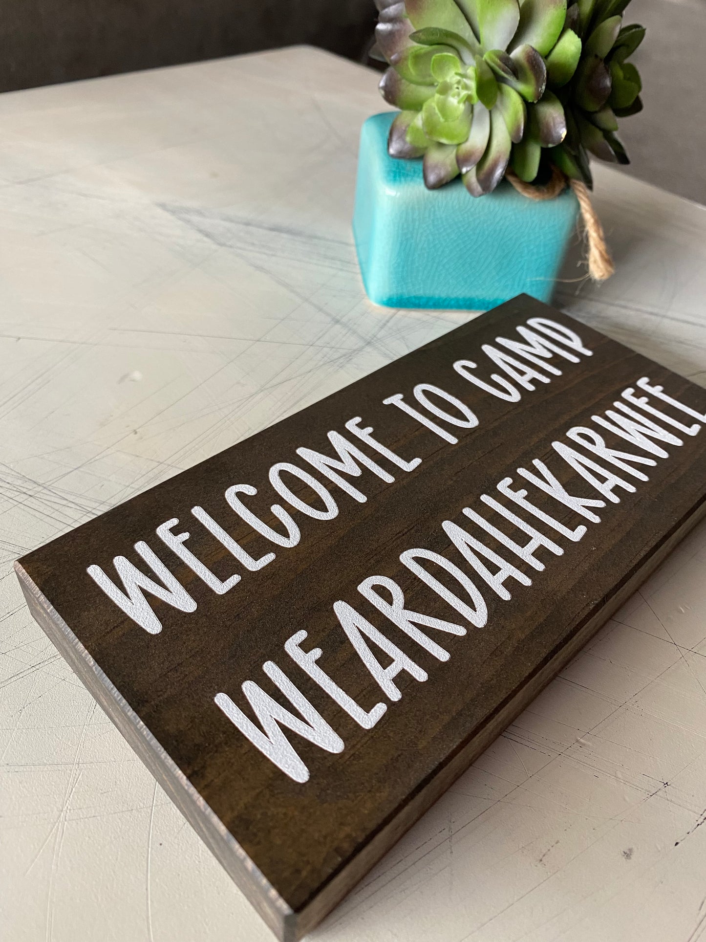 Welcome to Camp Weardahekarwee - Novotny Designs handmade mini wood sign in mocha