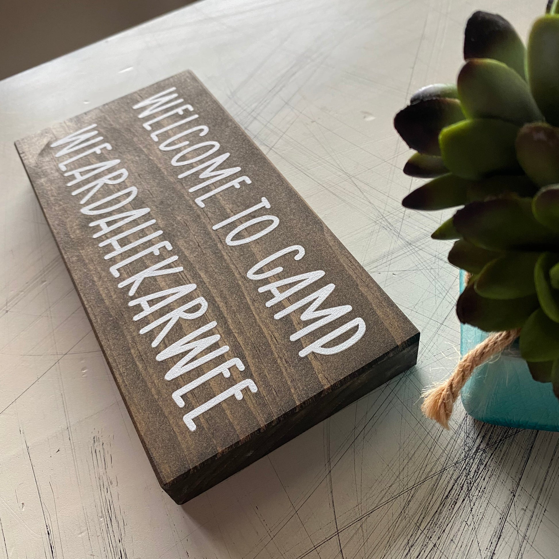 Welcome to Camp Weardahekarwee - Novotny Designs handmade mini wood sign in mocha