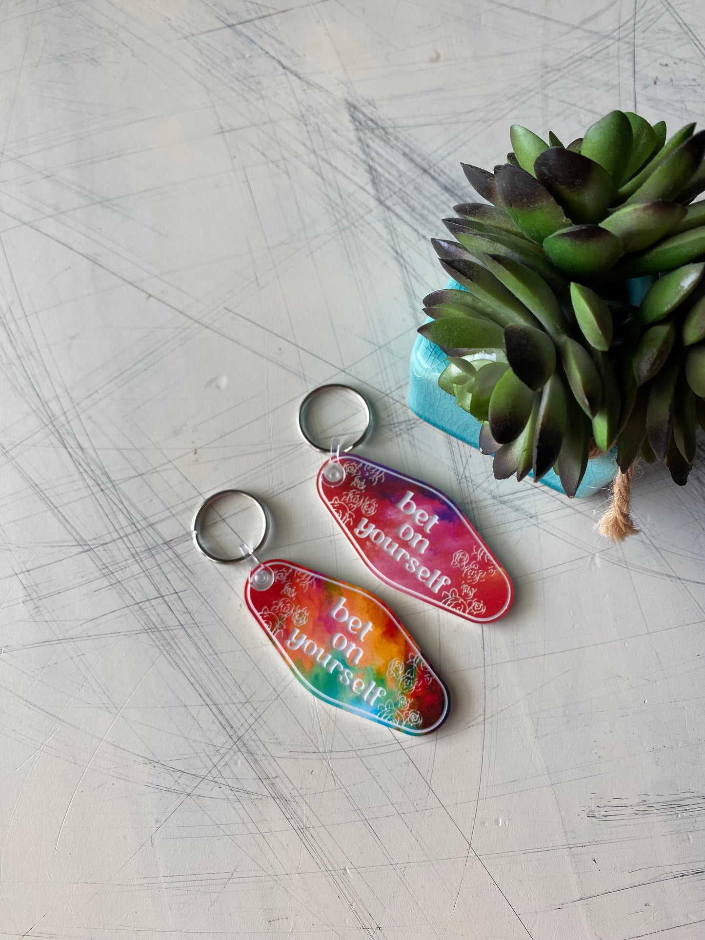 bet on yourself - Novotny Designs rainbow acrylic motel-style keychain