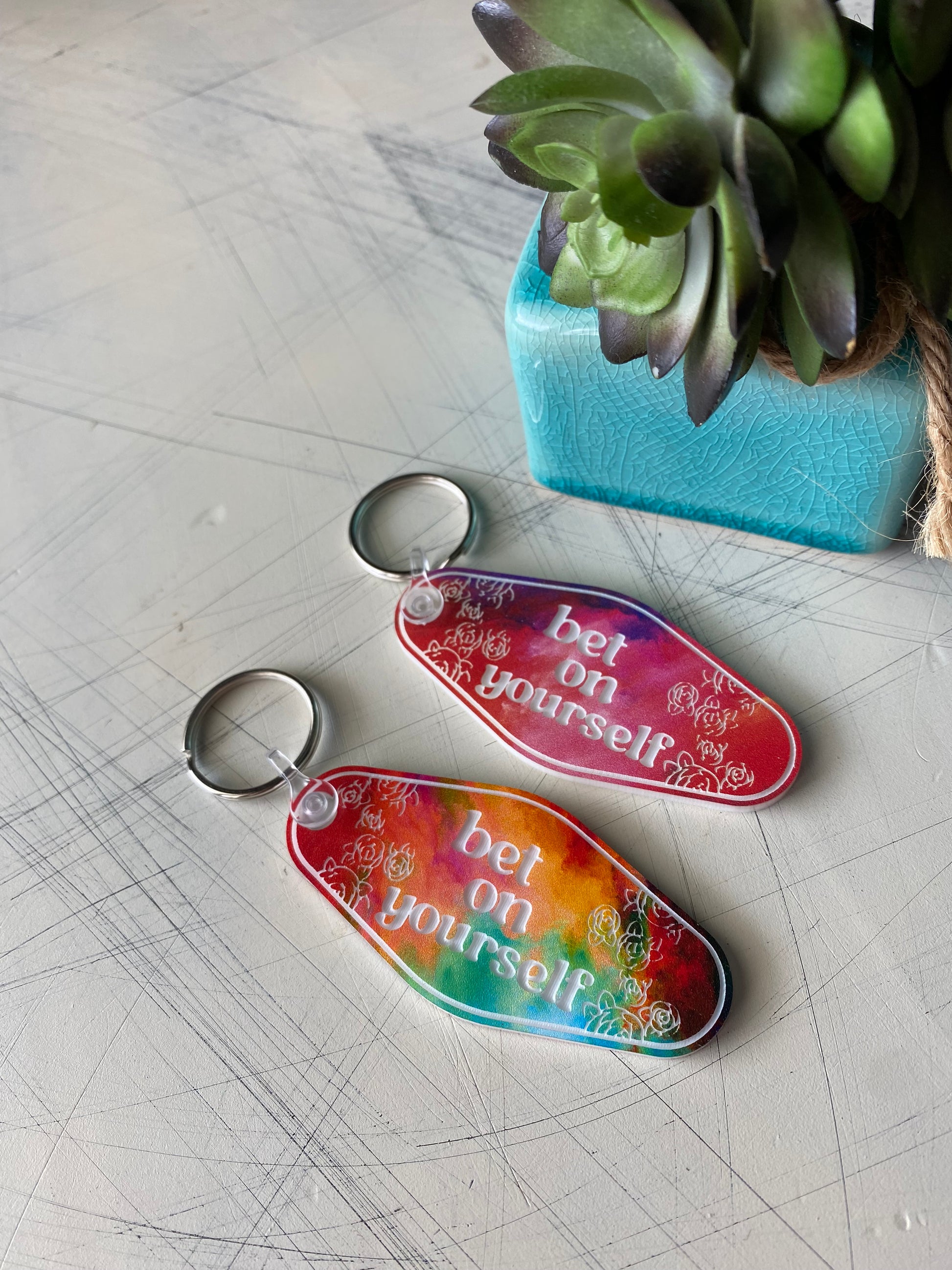 bet on yourself - Novotny Designs rainbow acrylic motel-style keychain