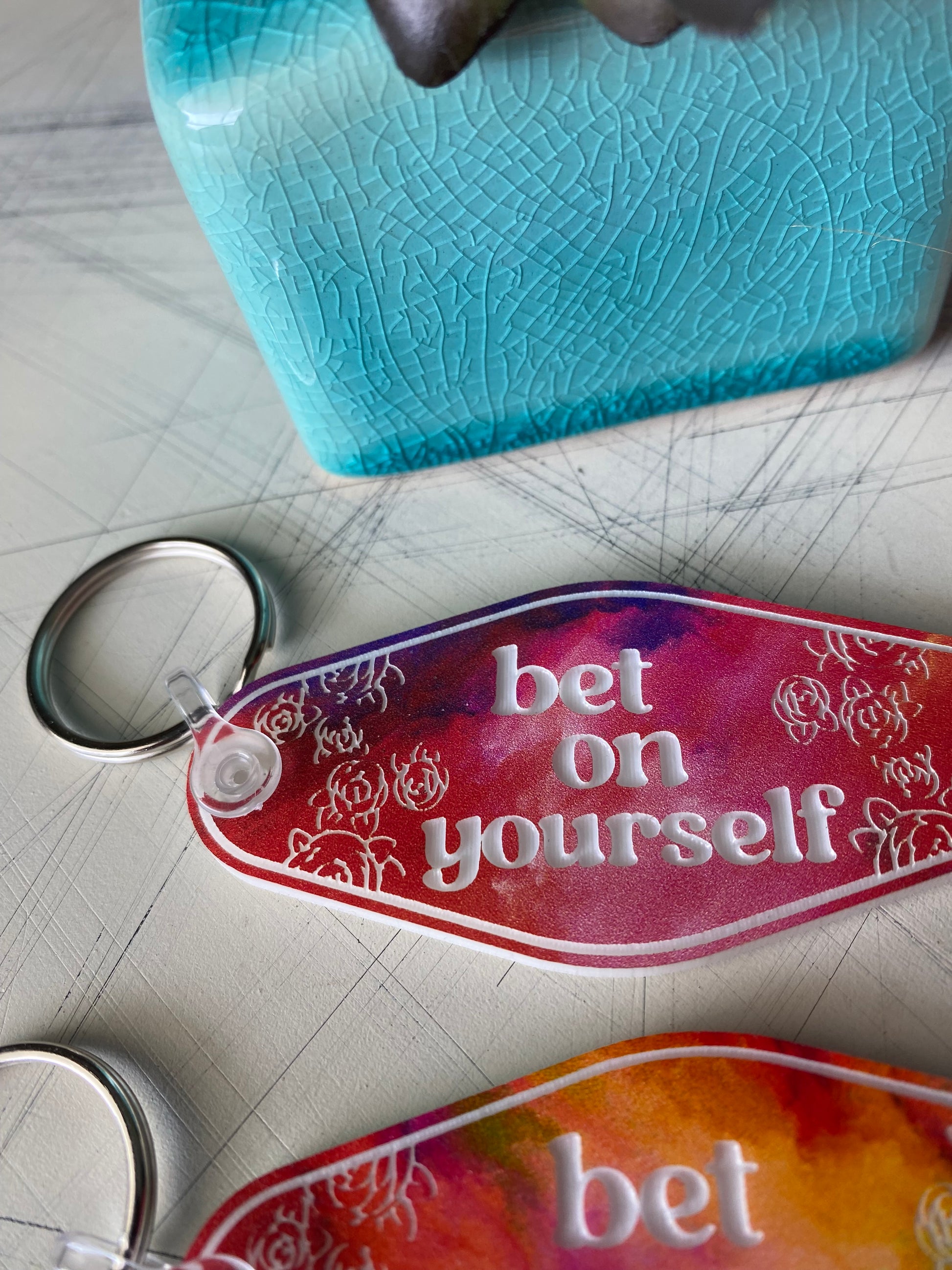 bet on yourself - Novotny Designs rainbow acrylic motel-style keychain