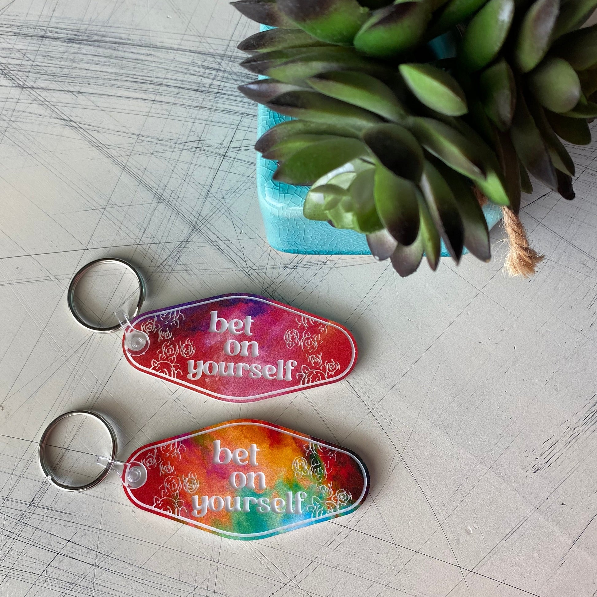 bet on yourself - Novotny Designs rainbow acrylic motel-style keychain