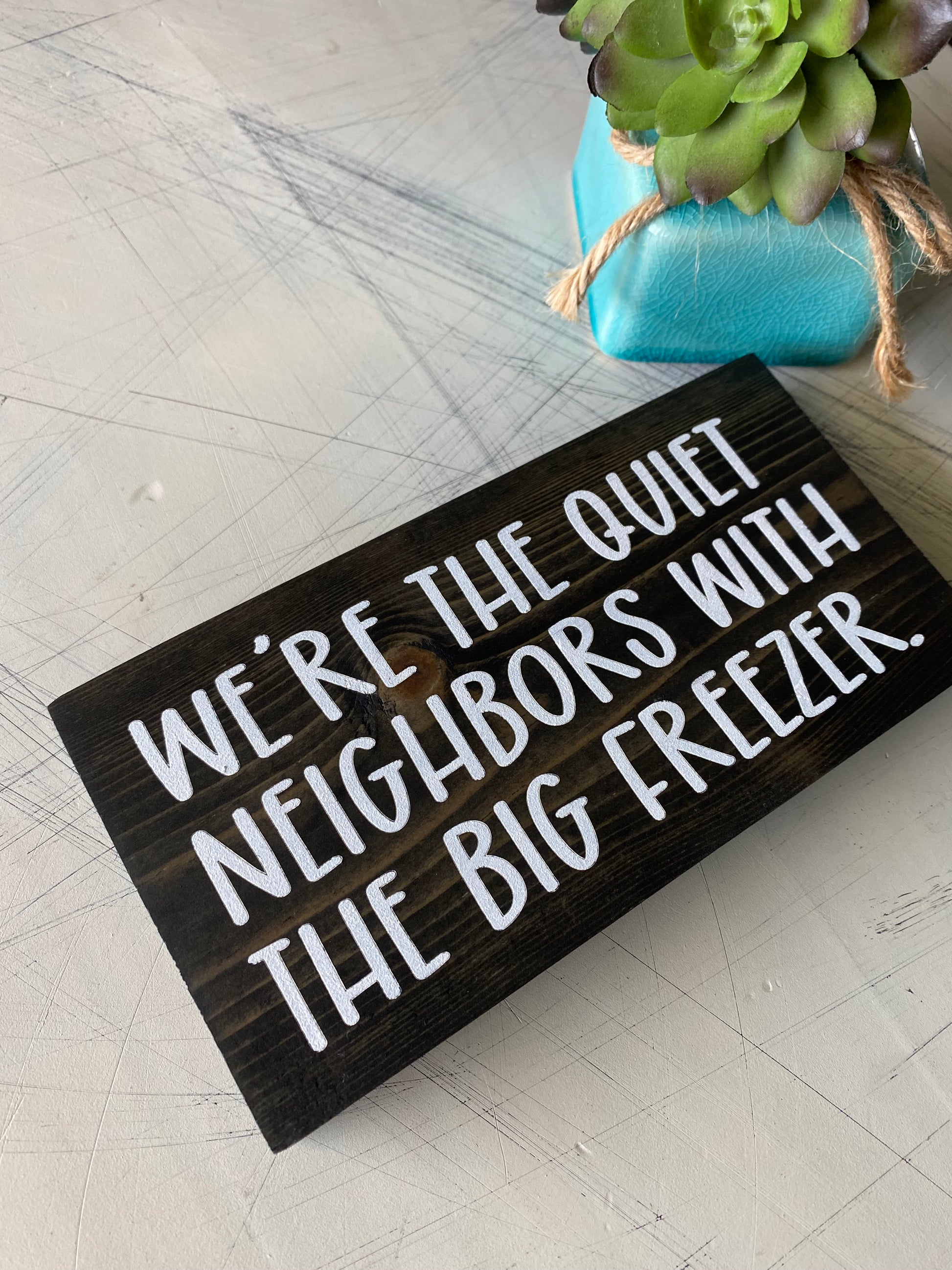 We're the quiet neighbors with the big freezer. - true crime - handmade mini wood sign