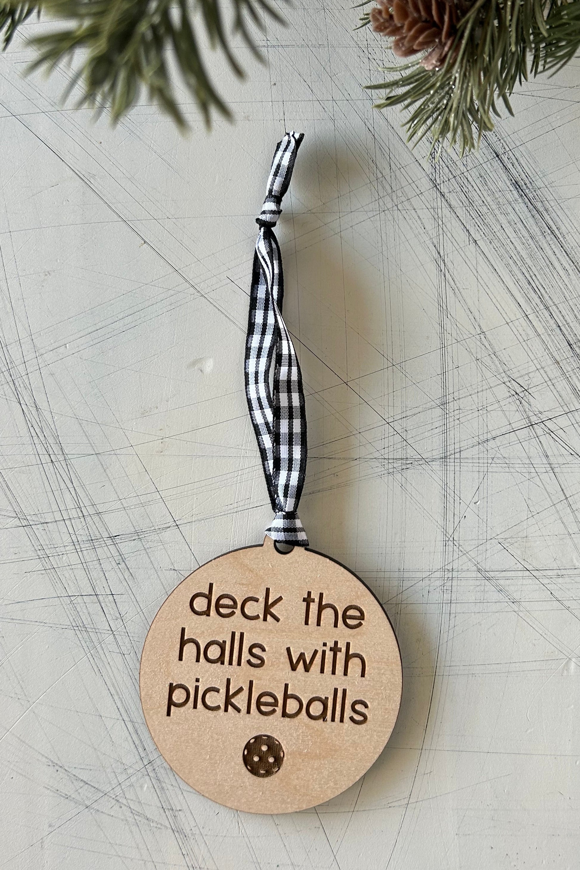 Deck the halls with pickleballs - Novotny Designs engraved maple ornament