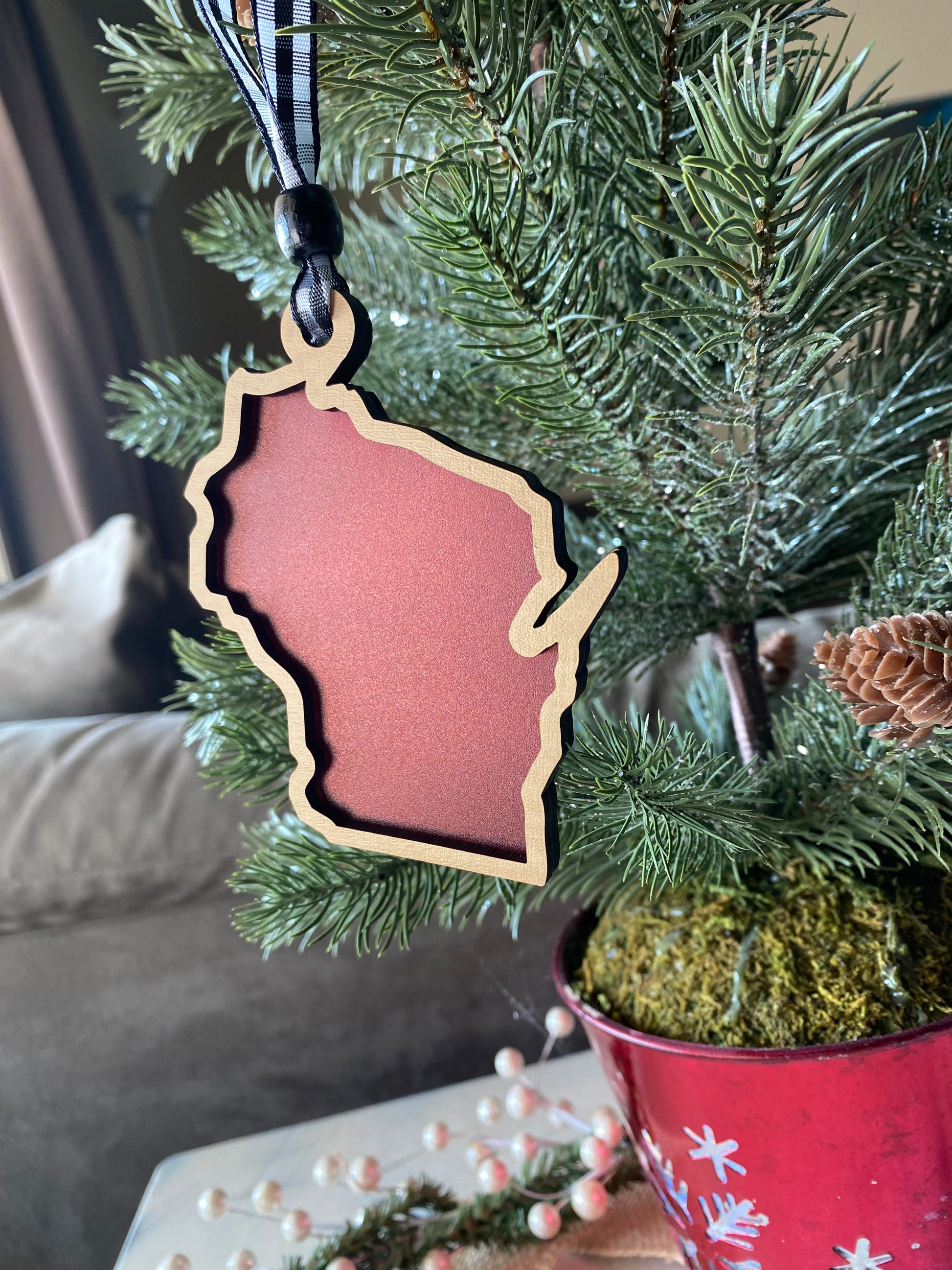 Wisconsin-shaped transparent ornament with buffalo plaid ribbon - Novotny Designs