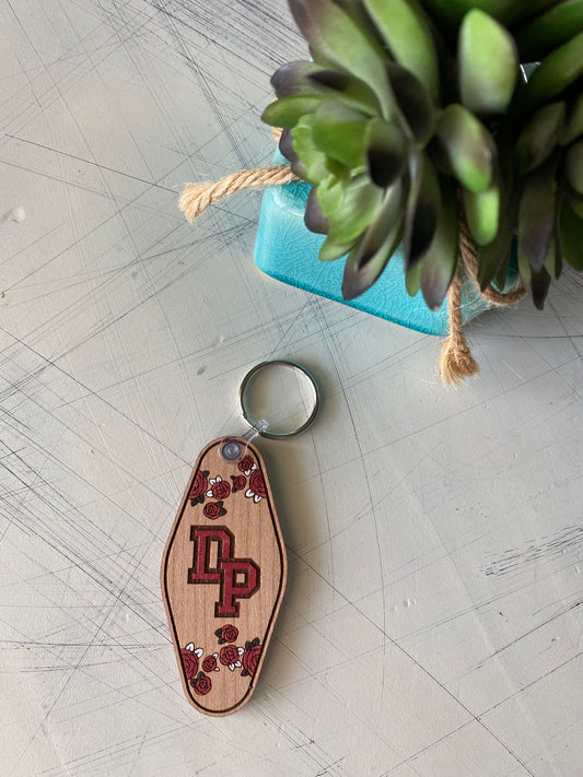 De Pere logo keychain - floral motel style wood keychain by Novotny Designs