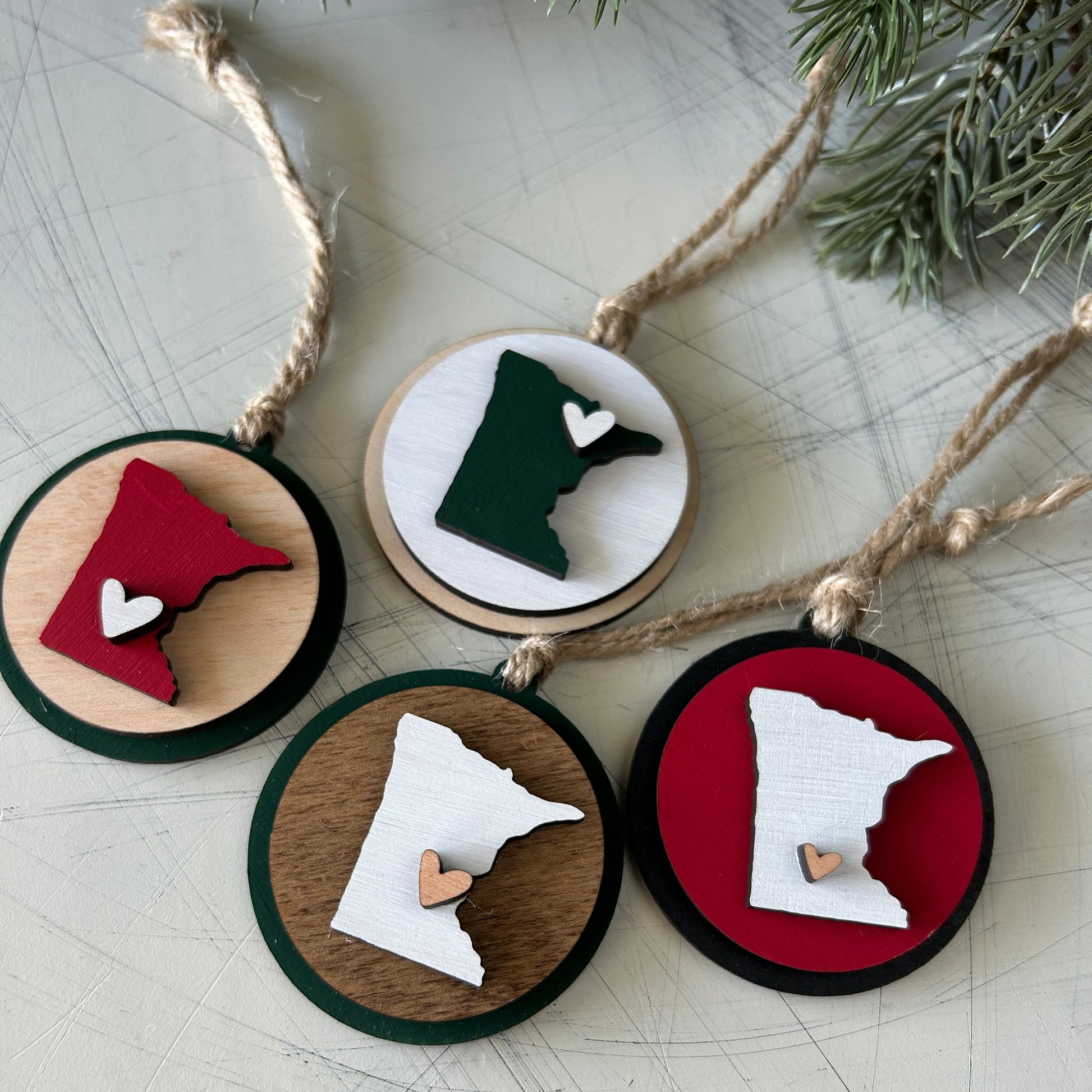 Small handmade Minnesota round ornament with heart by Novotny Designs