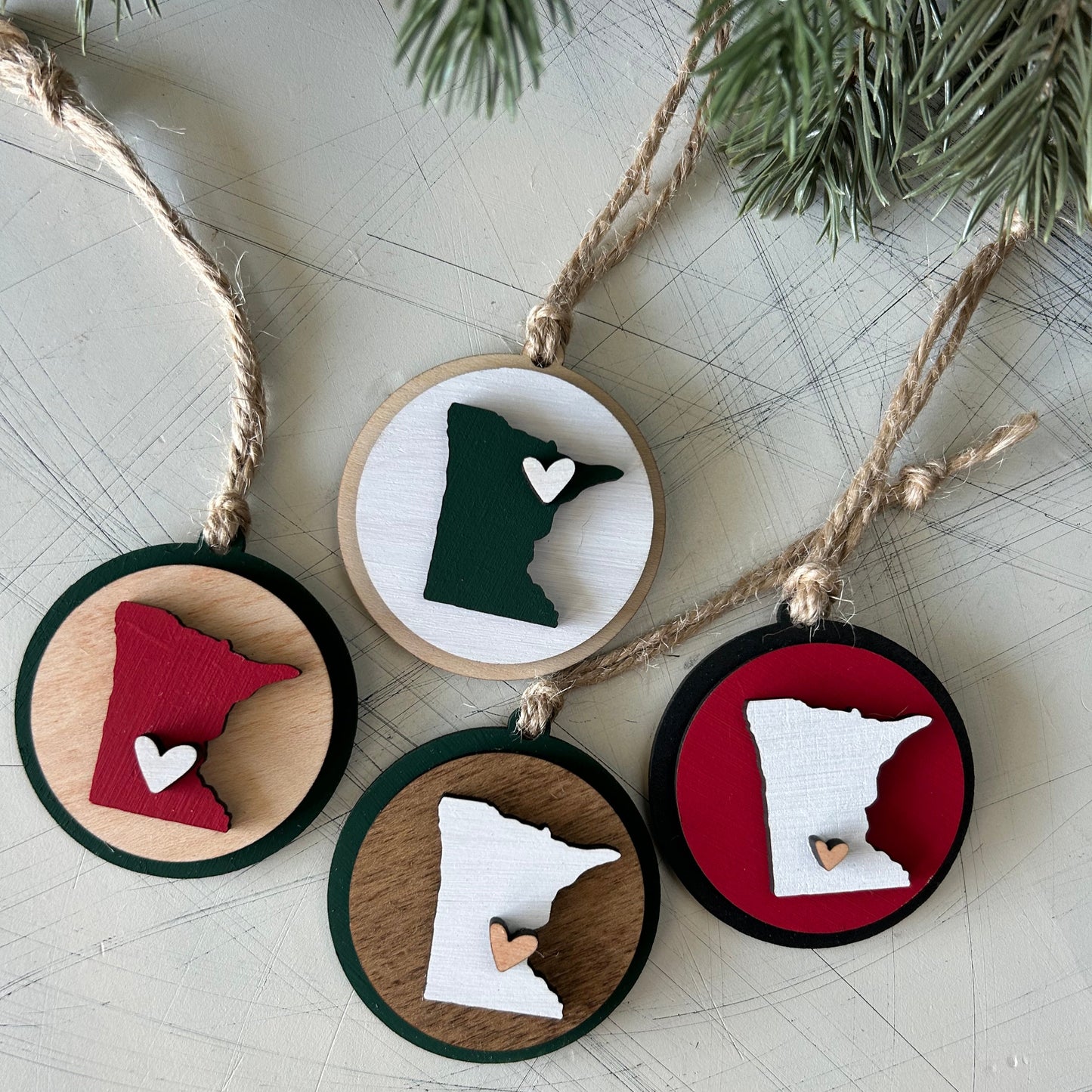 Small handmade Minnesota round ornament with heart by Novotny Designs