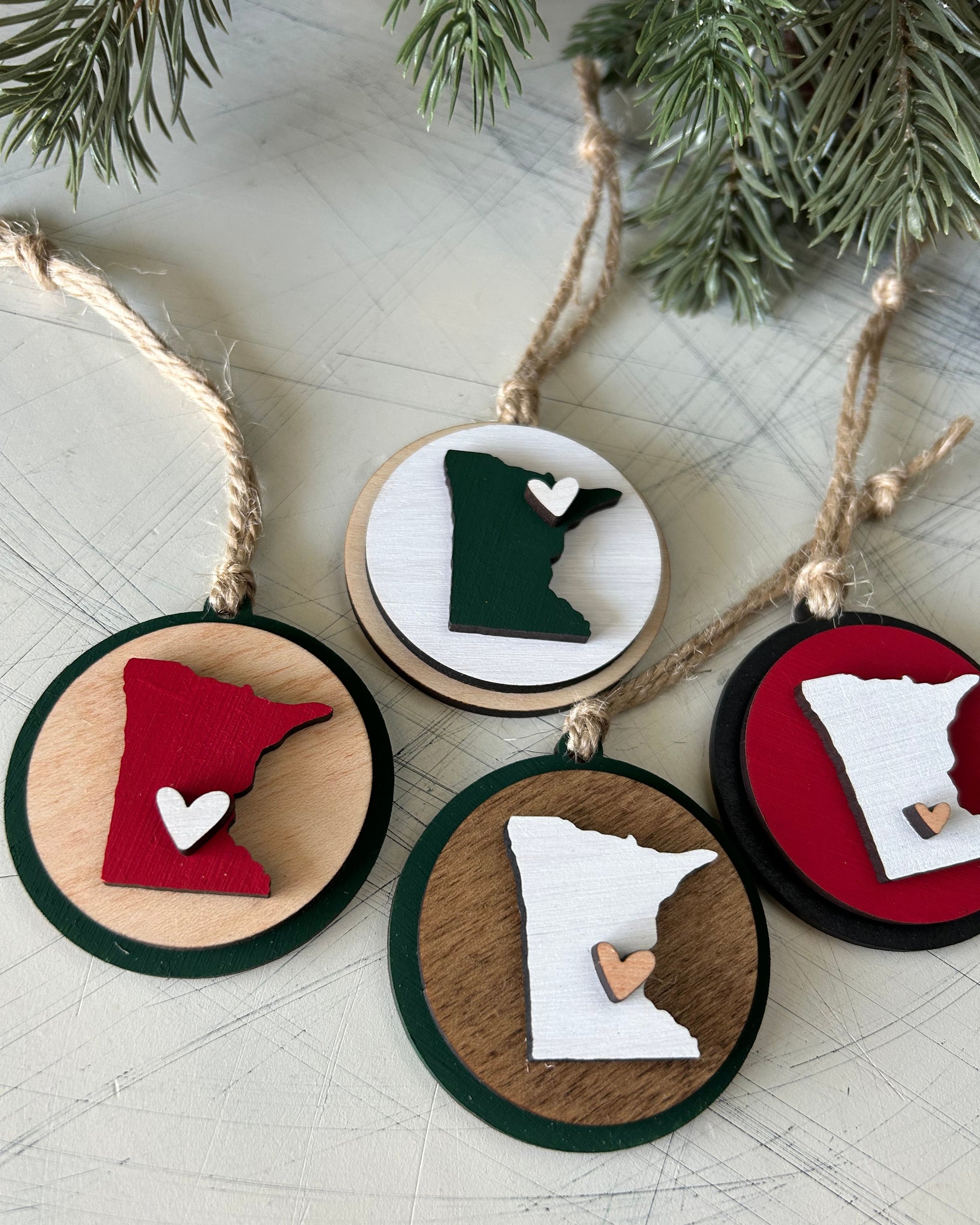 Small handmade Minnesota round ornament with heart by Novotny Designs