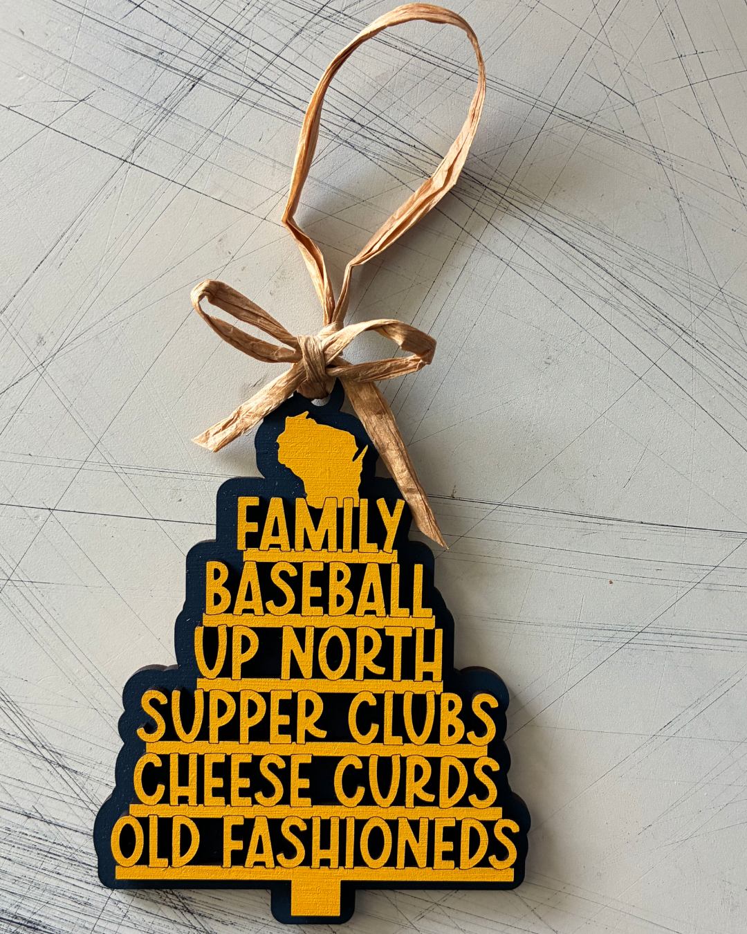 Handmade Wisconsin favorite things tree-shaped ornament in navy blue and yellow by Novotny Designs