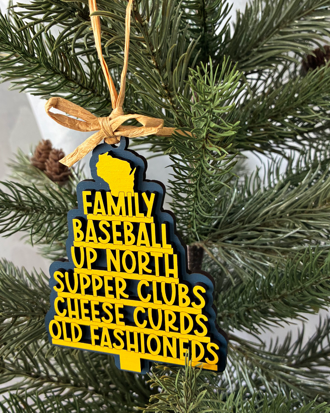 Handmade Wisconsin favorite things tree-shaped ornament in navy blue and yellow by Novotny Designs