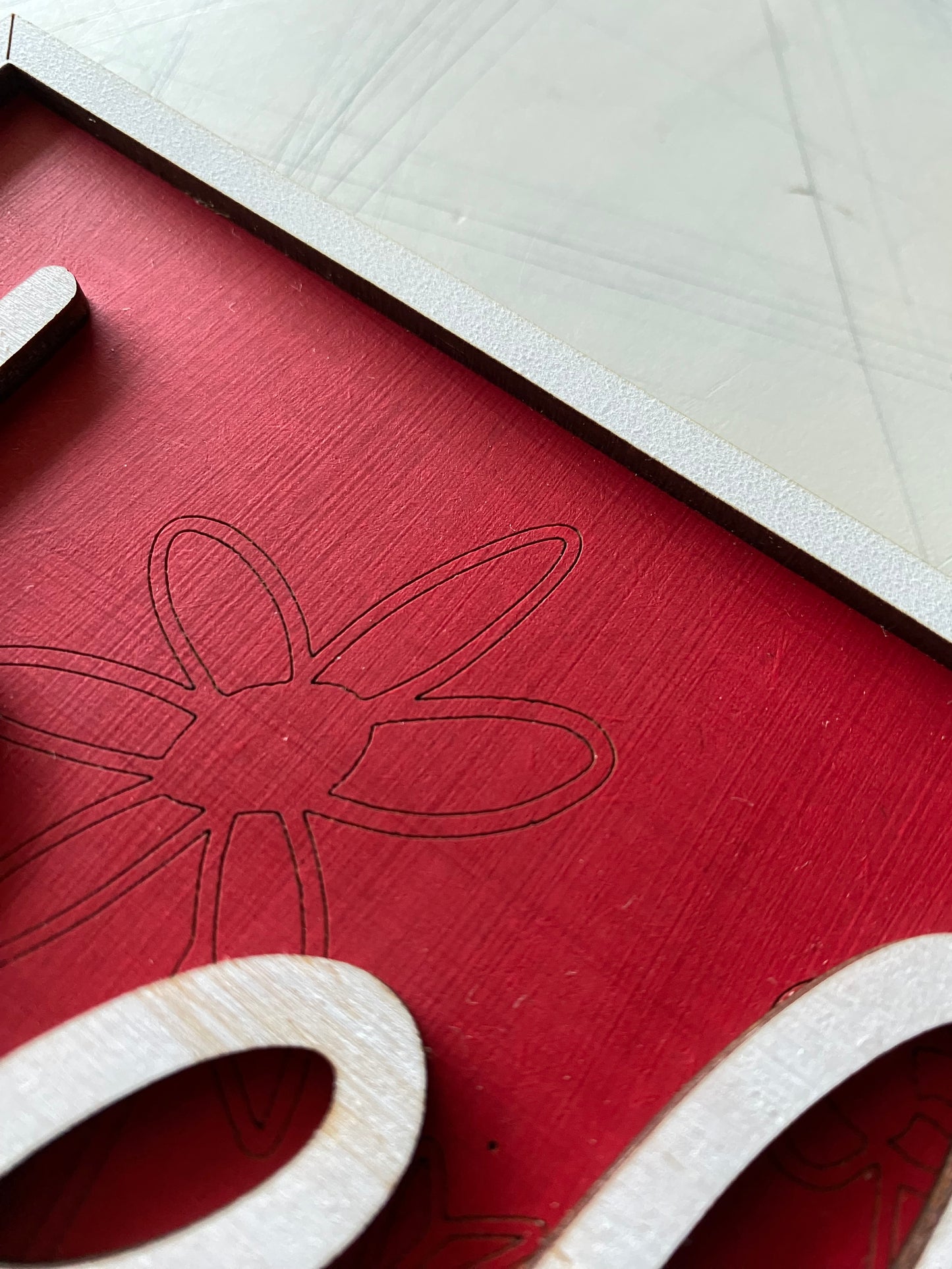 beloved - red and white 3d sign with hand drawn wildflower engraving