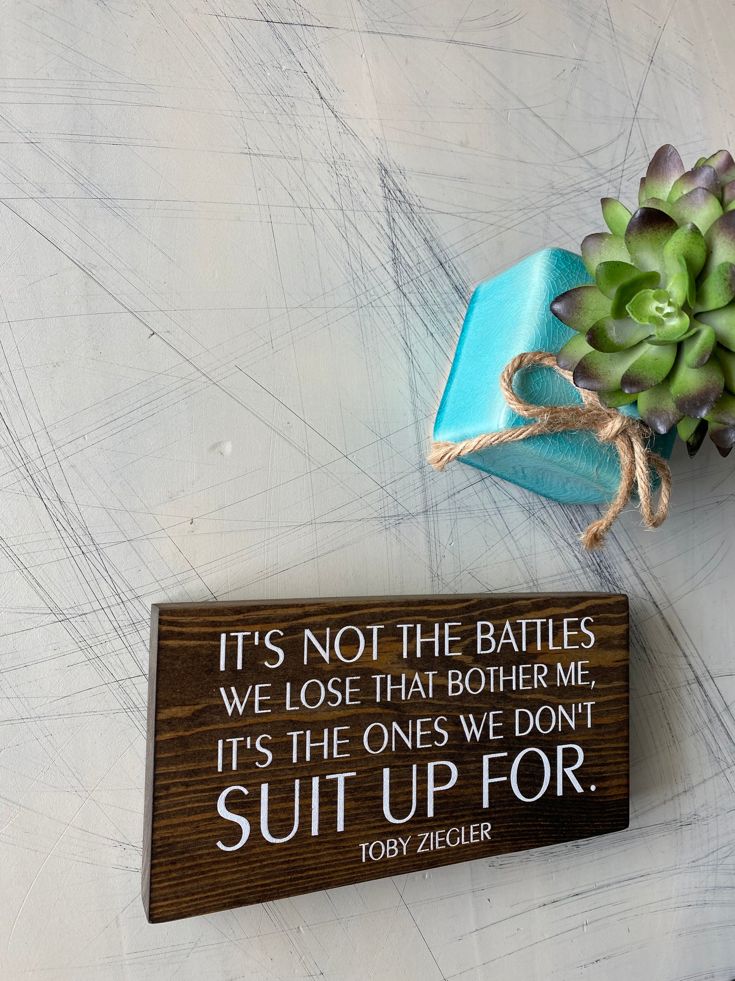 It's not the battles we lose that bother me, it's the ones we don't suit up for - Toby Ziegler - handmade mini wood sign